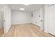 Unfinished basement area featuring light wood floors and a blank canvas for customization at 1420 Midland Way, Lawrenceville, GA 30043