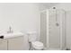 A bathroom featuring a shower, toilet, and sink at 1420 Midland Way, Lawrenceville, GA 30043