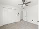Bright bedroom features neutral carpet and large closet at 1420 Midland Way, Lawrenceville, GA 30043