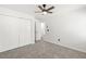 Bedroom with neutral walls and flooring with an ensuite bathroom at 1420 Midland Way, Lawrenceville, GA 30043