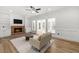 Bright living room with fireplace, built-in shelving and hardwood flooring at 1420 Midland Way, Lawrenceville, GA 30043