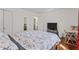 Comfortable bedroom with hardwood floors, closet, and natural light at 2383 Baker Nw Rd, Atlanta, GA 30318