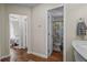Bright hallway featuring hardwood floors and access to the bathroom and bedroom at 2383 Baker Nw Rd, Atlanta, GA 30318