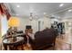 Inviting living room flowing into the kitchen area, featuring hardwood floors at 2383 Baker Nw Rd, Atlanta, GA 30318