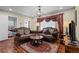 Inviting living room with hardwood floors, neutral walls, and a decorative chandelier at 2383 Baker Nw Rd, Atlanta, GA 30318