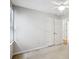 A bright bedroom with a ceiling fan, carpet, white walls, and bright windows, perfect for relaxation at 4284 Windy Gap Nw Ct, Kennesaw, GA 30144