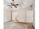 Large bedroom with neutral carpet and a ceiling fan at 4284 Windy Gap Nw Ct, Kennesaw, GA 30144