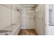 Walk-in closet with ample shelving and hanging space for organization and storage at 4284 Windy Gap Nw Ct, Kennesaw, GA 30144