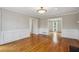 Bright living room featuring hardwood floors, white trim, and an open layout at 4284 Windy Gap Nw Ct, Kennesaw, GA 30144