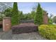 Entrance to Arden Lake neighborhood featuring a brick sign surrounded by manicured hedges at 4284 Windy Gap Nw Ct, Kennesaw, GA 30144