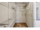 Organized walk-in closet featuring wire shelving and ample storage space, for optimal organization at 4284 Windy Gap Nw Ct, Kennesaw, GA 30144