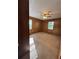 Bedroom with wood paneled walls and a ceiling fan at 5130 English Dr, Cumming, GA 30041