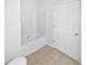 Clean, simple bathroom with white fixtures and beige flooring creating a functional space at 5763 Mitchell Chase Trl, Mableton, GA 30126