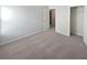 Neutral bedroom includes base molding, a walk-in closet, and light-grey carpet at 5763 Mitchell Chase Trl, Mableton, GA 30126