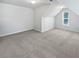 Spacious bedroom has neutral carpet, base molding, and natural lighting at 5763 Mitchell Chase Trl, Mableton, GA 30126