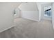 Bright bedroom features natural light from two windows and neutral carpeting at 5763 Mitchell Chase Trl, Mableton, GA 30126