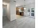 Bright dining area showcases oak cabinets, stainless sink, and French doors at 5763 Mitchell Chase Trl, Mableton, GA 30126
