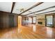 Spacious living room with hardwood floors and brick fireplace at 120 Westwood Nw Dr, Marietta, GA 30064