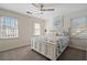 This beautiful bedroom is enhanced with with large windows that offer lots of natural light at 2125 Fairfax Dr, Alpharetta, GA 30009