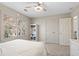Spacious bedroom offers a double closet, large window for natural light, and neutral decor at 2125 Fairfax Dr, Alpharetta, GA 30009