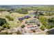 Beautiful aerial view of the golf course and clubhouse in a serene setting at 347 Woodridge Pass, Canton, GA 30114