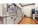 Modern kitchen featuring sleek countertops, stainless steel appliances, and ample storage, perfect for culinary enthusiasts at 347 Woodridge Pass, Canton, GA 30114