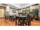 Meeting room with multiple tables and chairs, offering a refined space for gatherings at 347 Woodridge Pass, Canton, GA 30114
