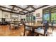 A meeting room featuring coffered ceilings, wood floors, and large windows at 347 Woodridge Pass, Canton, GA 30114