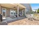Outdoor patio perfect for relaxation with stylish furniture and a ceiling fan at 347 Woodridge Pass, Canton, GA 30114