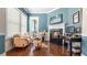Comfortable sitting area with fireplace and ample sunlight, offering a relaxing retreat at 347 Woodridge Pass, Canton, GA 30114