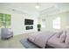 Relaxing main bedroom with fireplace, tray ceiling, and natural light at 3554 Cherry Bloom Way, Decatur, GA 30034