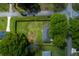 Aerial view showcasing the expansive backyard, mature trees, and the peaceful neighborhood setting at 4699 Ballew Dr, Powder Springs, GA 30127