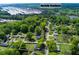 Aerial view of neighborhood with mature trees, proximity to Norfolk-Southern and other homes nearby at 4699 Ballew Dr, Powder Springs, GA 30127