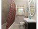 Compact bathroom with a shower-tub combo and a vanity with storage at 4699 Ballew Dr, Powder Springs, GA 30127