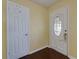 Inviting foyer with hardwood floors and two doors, one with decorative glass at 4699 Ballew Dr, Powder Springs, GA 30127