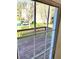 View of spacious deck through sliding glass doors; perfect for outdoor entertaining and relaxation at 528 Lantern Wood Dr, Scottdale, GA 30079
