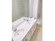 Bathroom featuring double sinks, mirror, toilet and shower at 528 Lantern Wood Dr, Scottdale, GA 30079