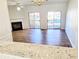 Inviting living room with a fireplace and sliding glass doors to the backyard at 528 Lantern Wood Dr, Scottdale, GA 30079