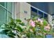 Modern building exterior showing the address number, large windows, and manicured landscaping at 860 Peachtree Ne St # 1010, Atlanta, GA 30308