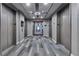 Spacious elevator lobby with modern carpeting, recessed lighting, and multiple elevator entrances at 860 Peachtree Ne St # 1010, Atlanta, GA 30308