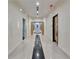 Hallway with tiled floors, recessed lighting, and multiple doorways for easy access at 860 Peachtree Ne St # 1010, Atlanta, GA 30308