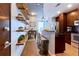 Modern kitchen with stainless steel appliances, granite countertops, and breakfast bar seating at 860 Peachtree Ne St # 1010, Atlanta, GA 30308