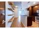 Modern kitchen with stainless steel appliances, granite countertops, and breakfast bar seating at 860 Peachtree Ne St # 1010, Atlanta, GA 30308