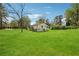 The backyard features a huge yard, mature trees and privacy at 961 Old Conyers Rd, Stockbridge, GA 30281
