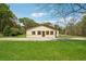 Charming single story home with spacious yard, concrete driveway, and mature trees at 961 Old Conyers Rd, Stockbridge, GA 30281