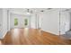 This spacious living room is bright with two windows and has gleaming floors at 961 Old Conyers Rd, Stockbridge, GA 30281