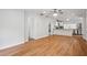 Open-concept living area boasts hardwood floors, recessed lighting, and access to the kitchen at 961 Old Conyers Rd, Stockbridge, GA 30281