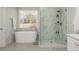 Luxurious bathroom features a soaking tub, glass shower, and modern finishes for a spa-like experience at 10575 Wren Ridge Rd, Alpharetta, GA 30022