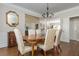Cozy dining room featuring hardwood floors and neutral walls at 10575 Wren Ridge Rd, Alpharetta, GA 30022