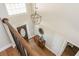 Bright foyer with hardwood floors, pendant lighting, and stained-glass front door at 10575 Wren Ridge Rd, Alpharetta, GA 30022